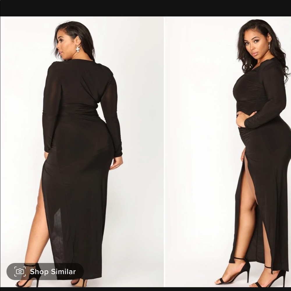 Long black dress with sleeves. Never worn tags still on it xl